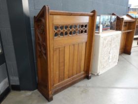 A pair of Victorian oak pew-fronts or lecterns, each with panelled fronts and decorated with Tudor