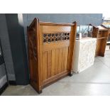 A pair of Victorian oak pew-fronts or lecterns, each with panelled fronts and decorated with Tudor