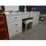 White bedroom dressing table together with stool and mirror