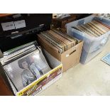 3 boxes containing vinyl records