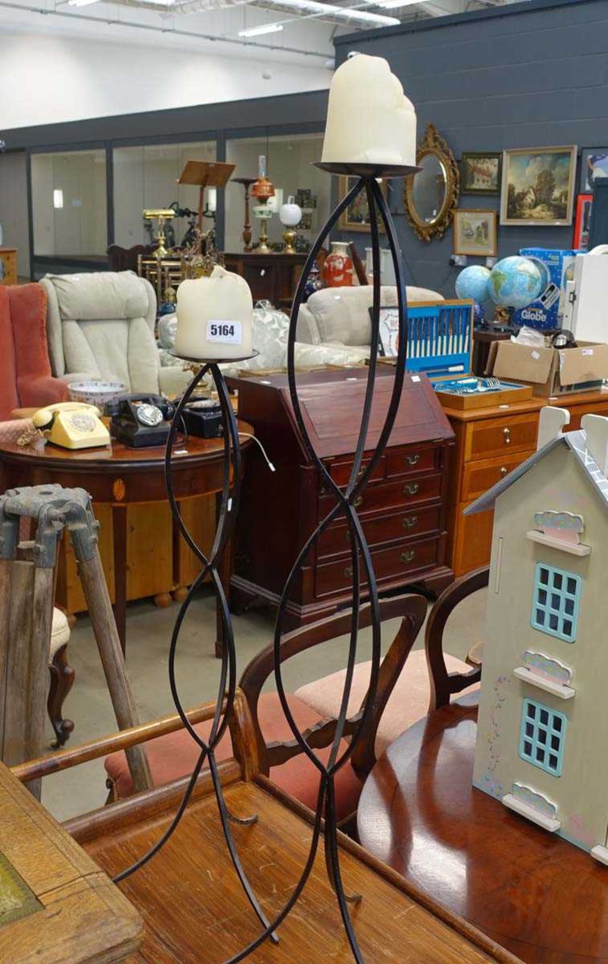 Pair of wrought iron candlesticks