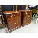 Pair of reproduction mahogany four drawer bedside cabinets
