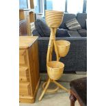 Bent cane plant stand