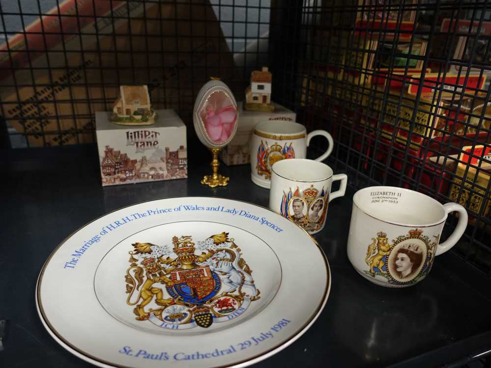 Cage containing paperweights, quantity of commemorative ware and 2 Lilliput Lane cottages