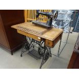 Singer treadle sewing machine plus one other