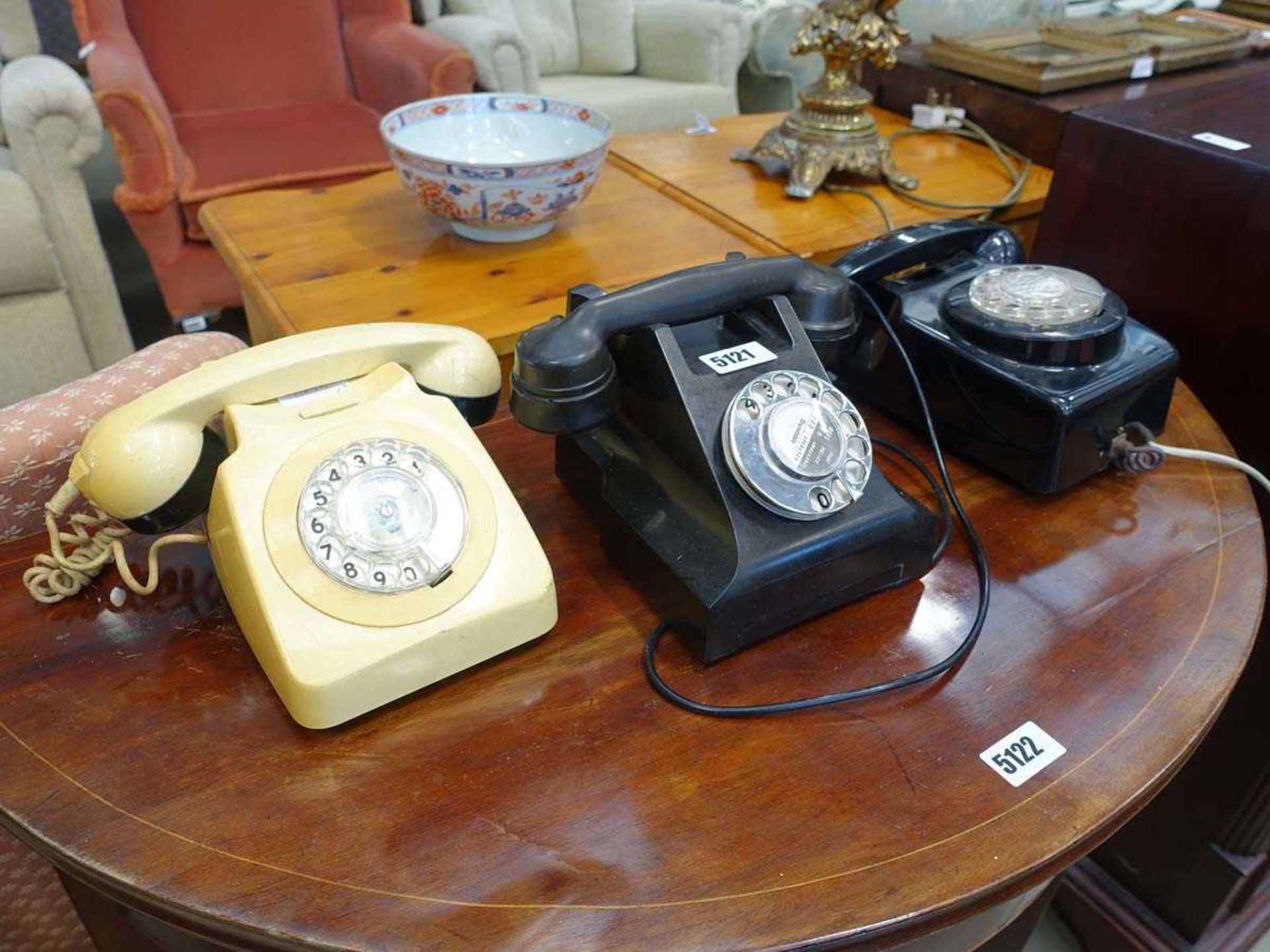 3 bakelite style telephones