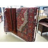 (4) Woolen Turkish carpet with floral pattern
