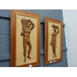 Two carved wall plaques in teak frames