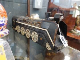 A Japanese Modern Toys battery operated tinplate steam train, l. 38.5 cmWorking order unknown.
