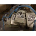 Bag containing large quantity of Laurel and Hardy video cassettes