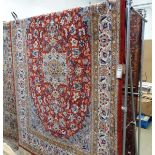 (7) Red floral Iranian carpet