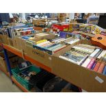 Five boxes containing paperback and hardback novels, books on anatomy, railway and natural history