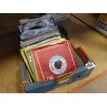 Box containing 7inch vinyl records to inc. The Beatles and Kinks