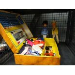 Cage containing Sindy dolls and clothing