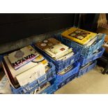 9 plastic baskets with quantity of clock and watch reference books