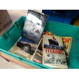 Box containing car magazines and books on the Titanic