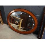 Edwardian mahogany oval bevelled mirror