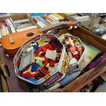 2 boxes containing soft toys and dolls, child's guitar, Lego pieces and board games