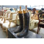 Pair of leather riding boots and wooden trees