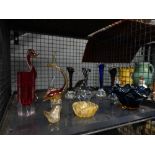 Cage containing glass vases, bowls and figures