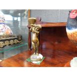 Bronzed cherub candlestick
