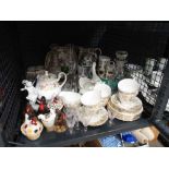 Cage containing floral patterned Colclough crockery, miniature egg baskets, decanter, jelly mould