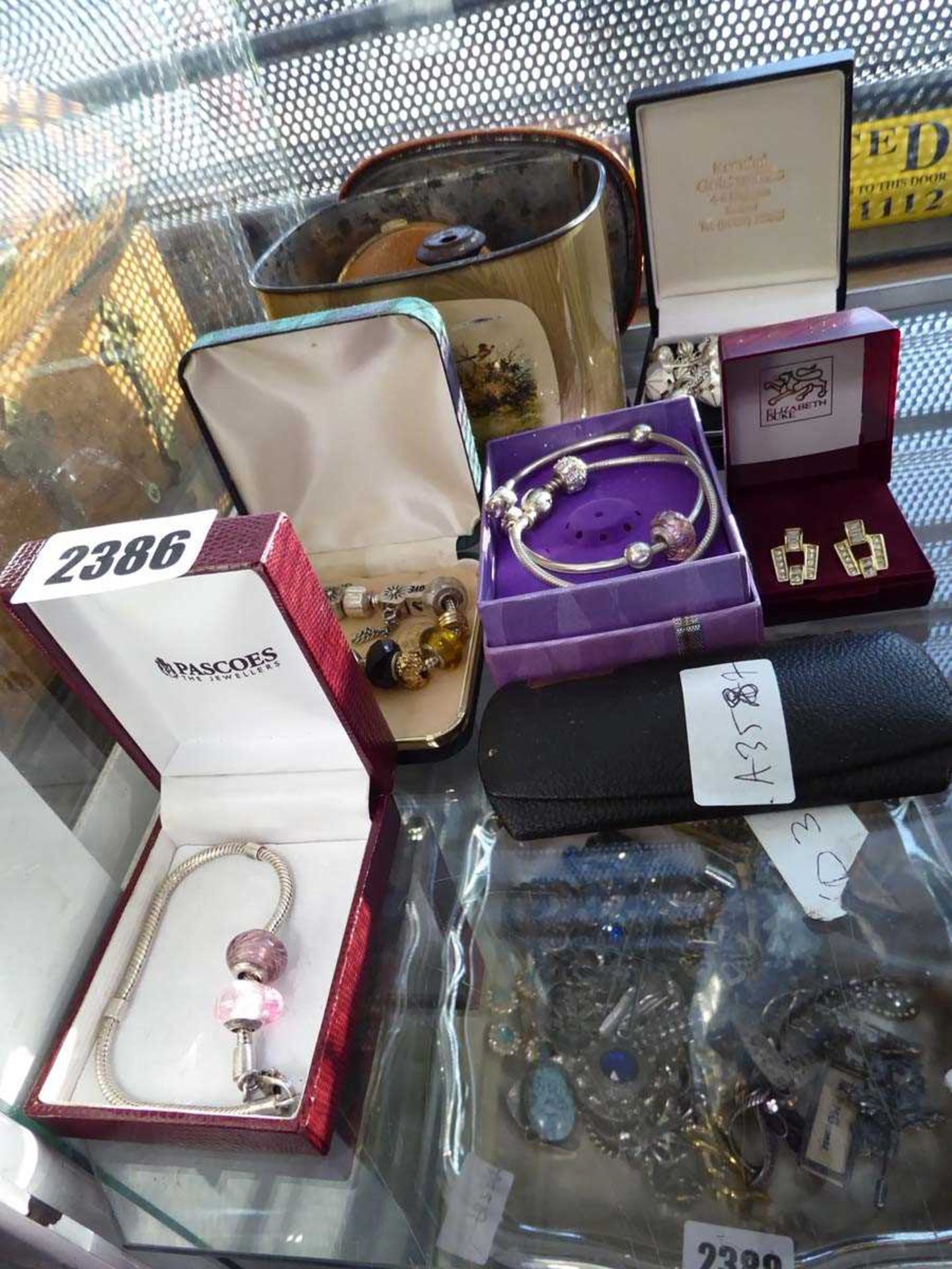 Small selection of charm bracelet and other jewellery items, earrings etc