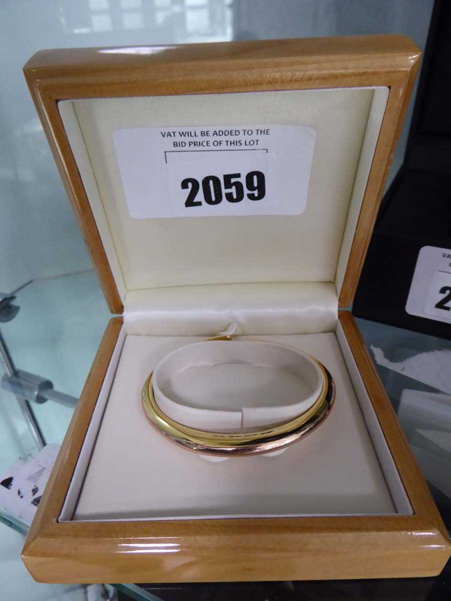 +VAT 14ct flexible gold wrist band with case