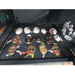 Cage containing a quantity of Venetian style masks