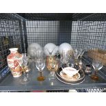 Cage containing wine and sherry glasses, satsuma vase, glass lampshades, salt cellar and mustard