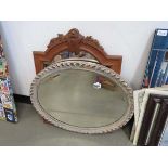 Oval bevelled mirror plus a mirror in natural wood frame