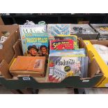 Box containing childrens annuals and books plus jigsaw puzzles