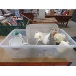 Box containing wine glasses, meat platter, jugs and kitchen storage vessels