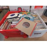 2 boxes containing 7'' vinyl records