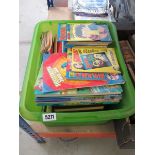 Box containing Beano annuals, magazines and other books