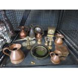 Cage containing copper jugs, clocks, miniature candlesticks, bell and brass figure of a pheasant