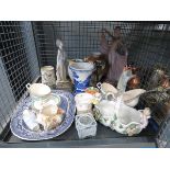 Cage containing a Lladro style figure, art deco lady, blue and white china, gravy boat and general