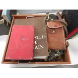 Box containing horse brasses, map book, camera plus glassware