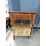 A cased sewing machine plus an olive green ottoman sewing seat