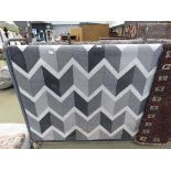 Grey carpet with chevron pattern