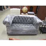 Grey suede effect button back two seater sofa