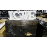 Pallet of 'Love' signs