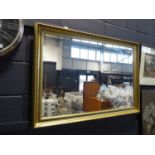 Rectangular gilt framed bevelled wall mirror