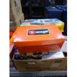 Box containing various die cast vehicles