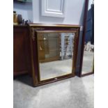 Mahogany effect and gilt, framed and beveled rectangular wall mirror