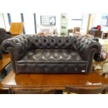Black button back upholstered Chesterfield type childs 2 seater sofa