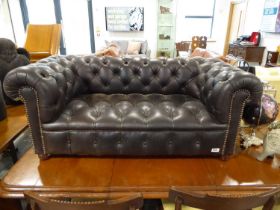 Black button back upholstered Chesterfield type childs 2 seater sofa