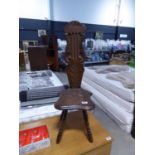 Dark oak spinning chair