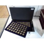 Small flight case containing trays of UK £1 and £2 coinage