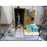 Cased microscope and various slides and accessories